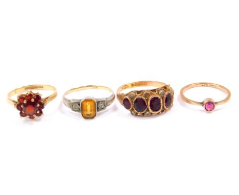 A 9ct gold and garnet flower head cluster ring, size O, together with a 9ct gold and garnet five stone ring, size R,  and a 9