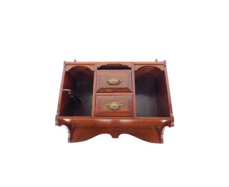 A Victorian mahogany and pine wall mounted smokers cabinet, the galleried top over two central drawers, flanked by recesses, 