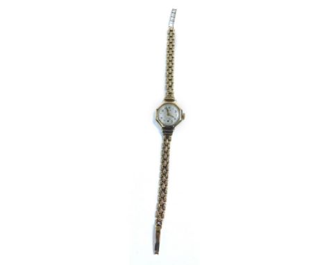 An Avia lady's 9ct gold cased wristwatch, circular dial bearing Arabic numerals, subsidiary seconds dial, in an octagonal cas