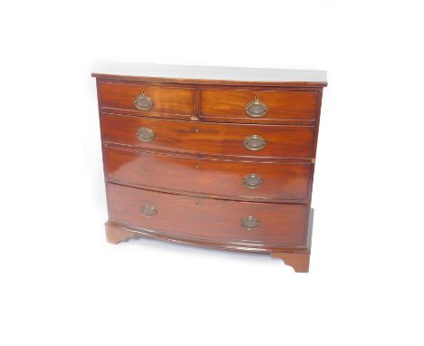 A George III mahogany bow front chest of drawers, of two short over three long drawers, raised on bracket feet, 93cm H, 112cm