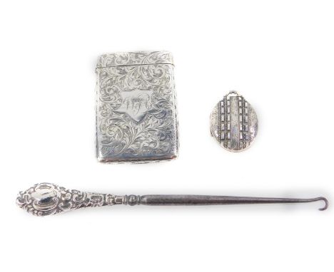 An Edward VII silver calling card case, with engraved foliate decoration, shield reserve, monogram engraved, Birmingham 1901,