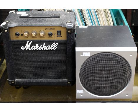 A Marshall G10 MKII amplifier together with a small speaker
