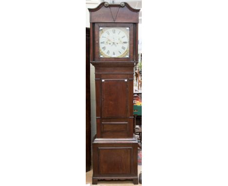 A George III oak and mahogany eight day longcase clock, circa 1815, the hood with a swan-neck pediment, the glazed door openi