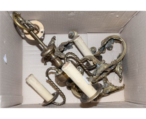 A brass light fitting and gilt metal wall hooks