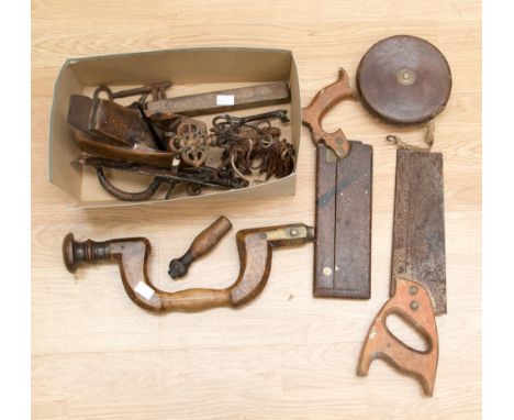 A quantity of woodworking tools to also include a retractable leather cased measure and various keys etc