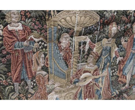 A large tapestry hanging, possibly called 'Concert by the Fountain', reproduction style 