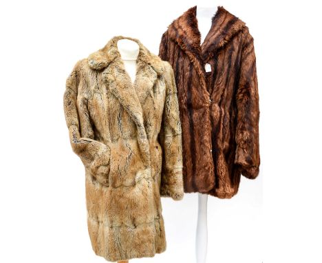  A ladies' brown musquash jacket with a ladies' light coloured thigh length coat