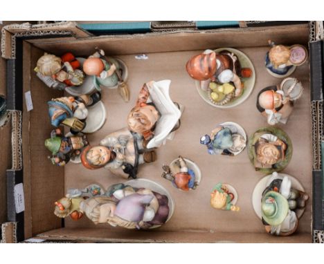 A collection of Goebel figures