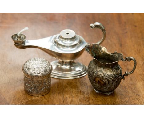 A George V silver 'Aladdin' style lamp with swan neck handle, Elkington & Co, Birmingham 1929, a cylindrical white metal box 