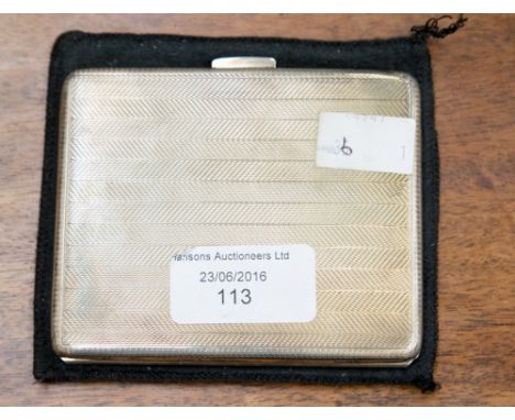 A George VI silver cigarette case, engine turned herring bone decoration, gilt interior, maker JK, Birmingham 1945, 130 grms,