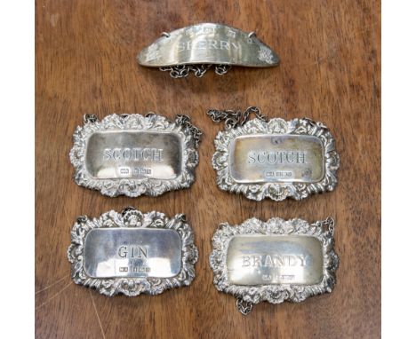 Five Elizabeth II silver bottle tickets, to include Brandy, Scotch, Gin, and Sherry, total gross combined weight 2.5 ozt/ 78 