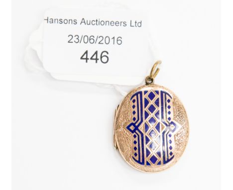 A Victorian 9 ct gold front and back locket with enamel detailing 