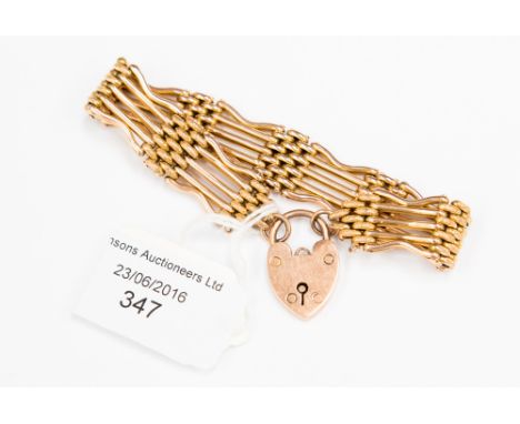 A 9 ct rose gold five-bar gate bracelet with padlock clasp, approx. 18.5 grms 