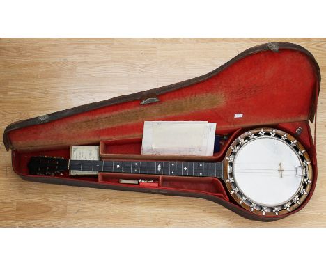 A Windsor zither banjo in case, model six, and a quantity of sheet music (2)