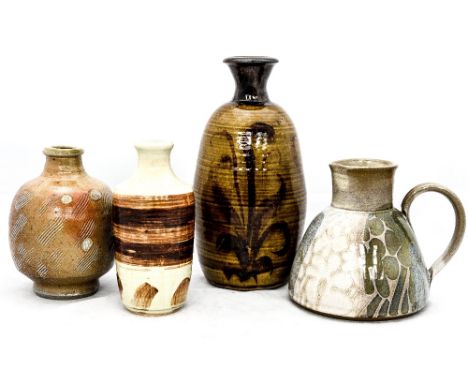 ***PLEASE NOTE AMENDED DESCRIPTION***A Diana Worthy pitcher, (born 1940), with three studio pottery vases (4)