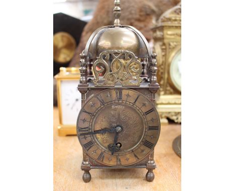 A Smith's brass lantern clock with key