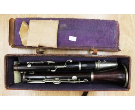 A cased clarinet, marked Rotterdam