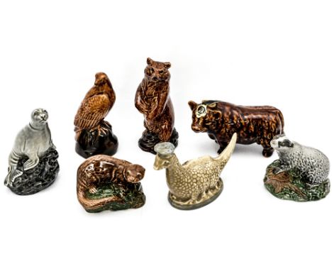 Seven whisky decanters, some by Beswick in the form animals (7)
