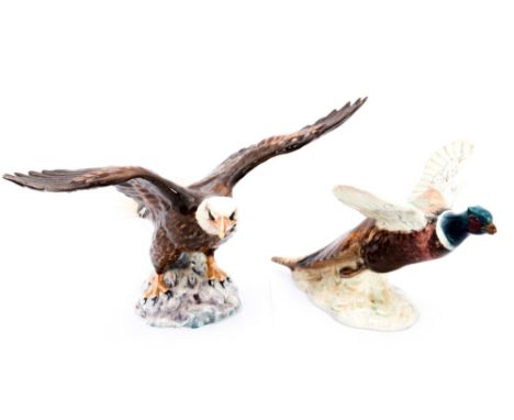 A Beswick model of a pheasant about to fly, 849, and a Beswick 'Bald Eagle', 1018 (2)