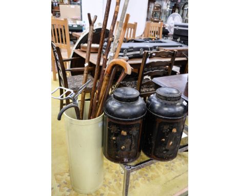 A tubular composite stick stand (floral design) with sticks, shooting stick, hunting horn and whip