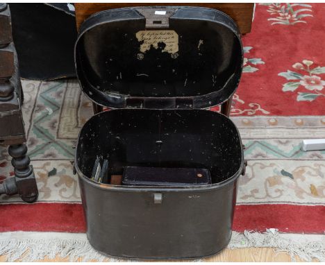 A mid 19th Century large ladies' travelling metal trunk for hats and accessories, with empty cutlery boxes