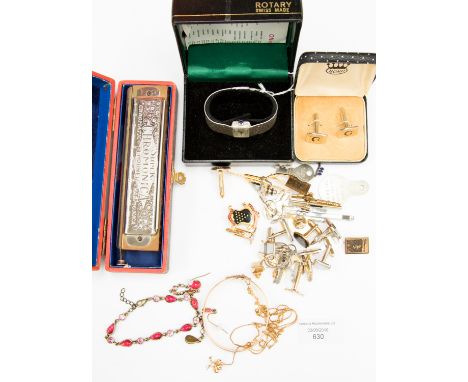 A boxed Rotary Swiss made ladies' silver wristwatch, London, 1975, a large quantity of vintage cufflinks, a gold plated brace
