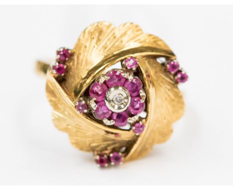 A diamond and ruby set 18 ct yellow organic style cluster ring, 7.2 grms approx, ring size Q