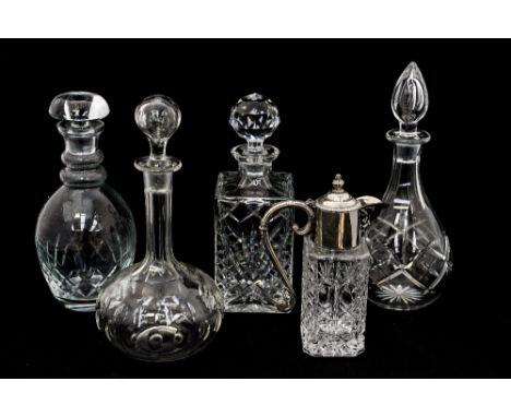 Four various decanters, including a Thomas Webb cut glass decanter, a Victorian shaft and globe decanter, plus two others and