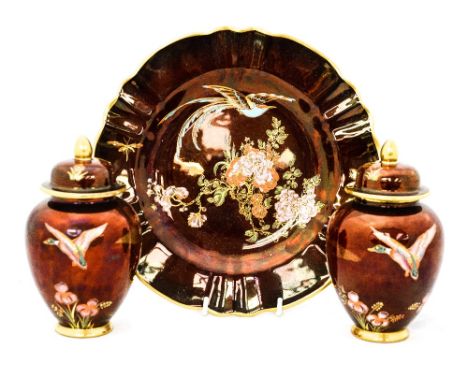 A Carlton ware 'Rouge Royale' plate and two vases with covers (3)
