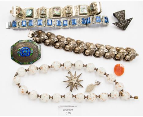 An Art Deco clip, Mexican silver bracelet, enamel 1920s brooch, a paste brooch etc (9)