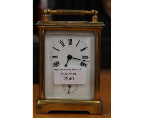 A brass carriage clock 