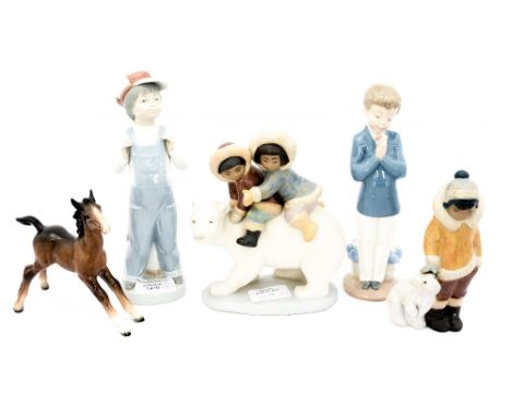 Three Lladro figures, one Nao and a Beswick horse