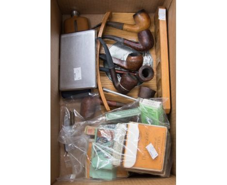 An Art Deco pipe rack with six briar pipes, a cigar cutter and tamper, Malaya cigarette case, Ronson lighter, hip flask and a