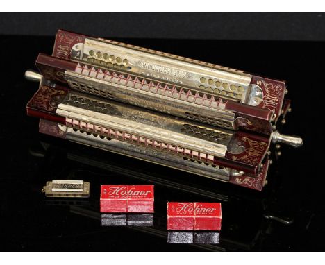 Hohner six sided harmonica, boxed together with three miniature Hohner harmonicas, two boxed