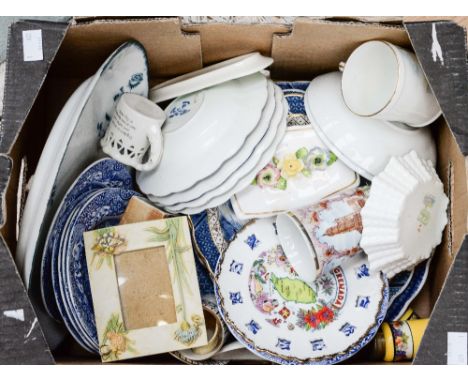 A box of blue and white including Booths 'Real Old Willow', Spode, and various crested ware, including a Shelley Melody 'Knar