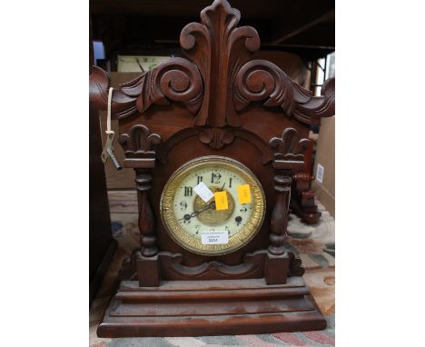 A late nineteenth Century, United Clock Co, Birmingham, mantle clock, enamel dial, Arabic numerals, mahogany frontage, with k