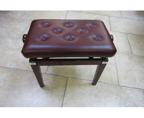 Piano Stool New stock
A mahogany adjustable piano stool with a leatherette button down seat.