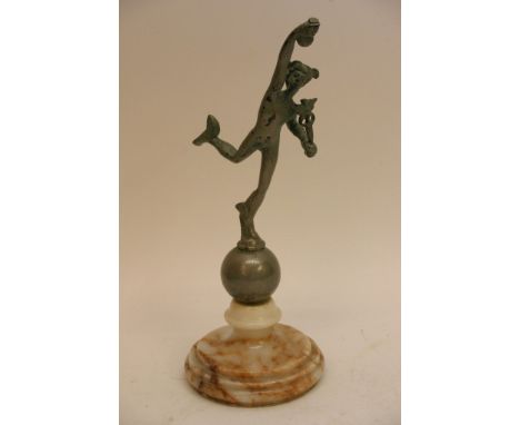 A vintage 1930's metal car mascot of Mercury mounted on later base