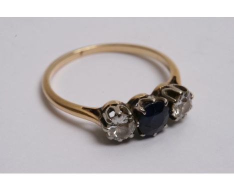 A Sahpire and diamond three stone ring