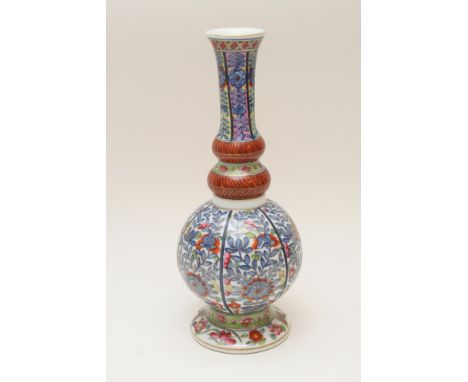 A 18th centaury style Chinese double ring neck vase decorated with flowers and foliage