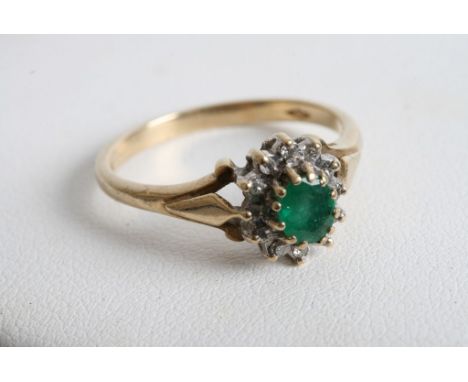 A 9ct gold emerald and diamond ring 