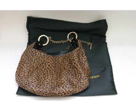 Fendi ladies leopard print handbag having gold tone hardware with Fendi dust bag. 