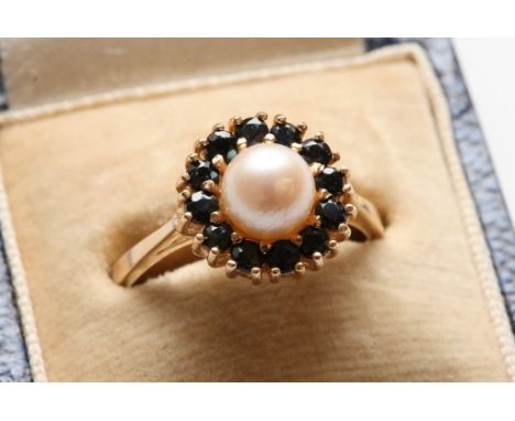 A 9ct gold sapphire and pearl ring. 