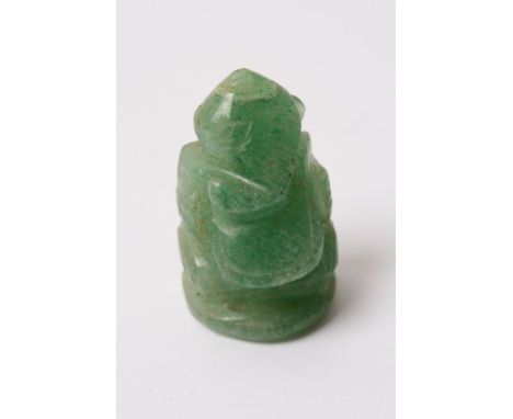 A small covered Jade seal