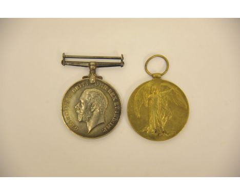 Two First World War medals awarded to K9180 H.E.HOLLAND. ACT.L.STO. R.N.