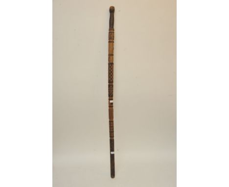 An unusual carved German stick dated 1942