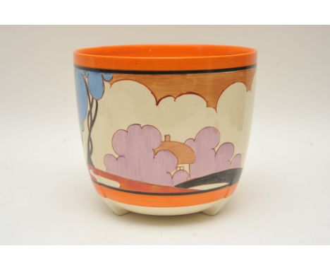 A Clarice Cliff Jardiniere decorated in the Autumn pattern,star crack to base , (height 20cm)