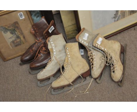 A collection of vintage leather ice skating boots maker Joh.pet Becker