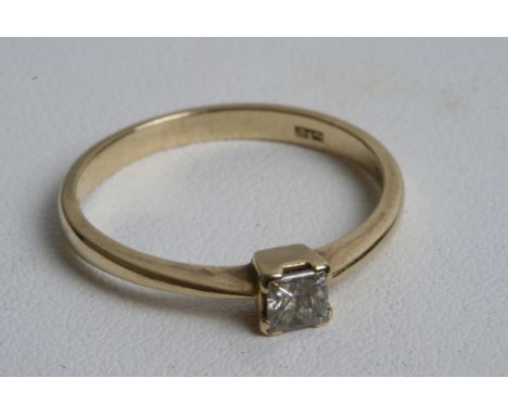 A 9ct gold and diamond ring