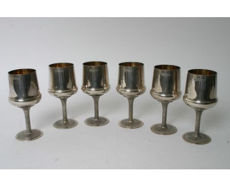 A set of six silver wine cups, London hall marked 